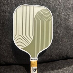 Green and white color pickleball black paddle
